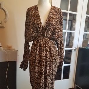 v-cut dress with slits on back and sleeves